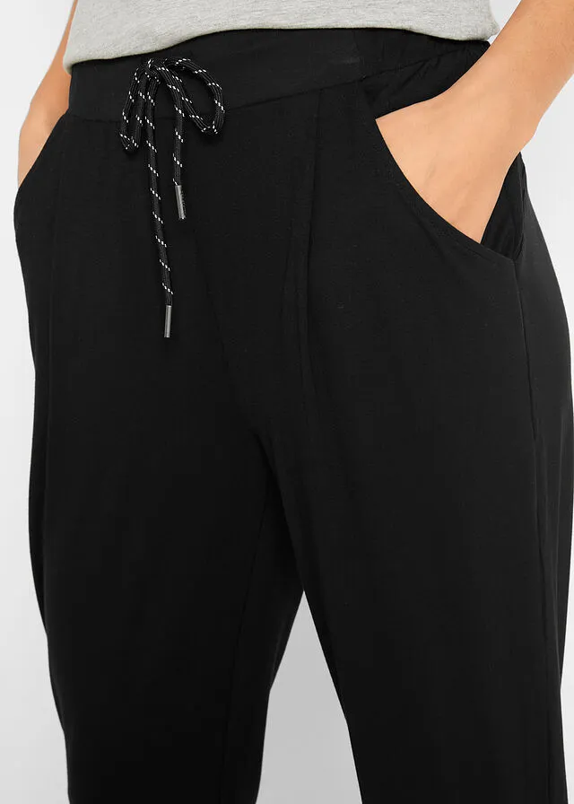 Pantalón deportivo ultrasuave de viscosa sostenible, largo 7/8 Negro